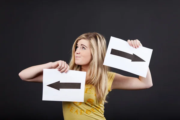 Teenage girl confused about directions — Stock Image Teenage girl confused about directions Stock Picture