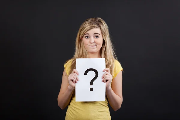 Confused Blond Teenage Girl With Arrow Sign — Stock Photo, Image