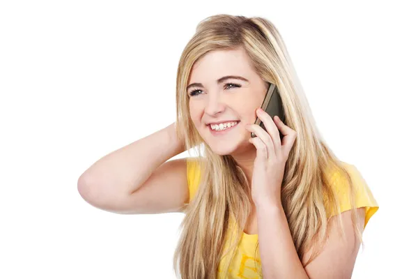 Feliz adolescente rubia chica usando el teléfono móvil —  Fotos de Stock