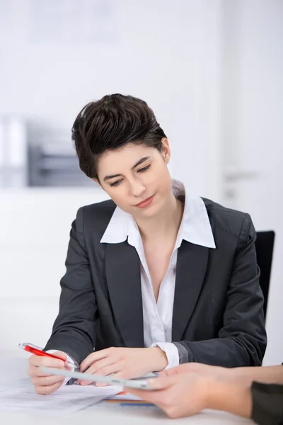 Businesswoman Looking At Digital Tablet — Stock Photo, Image