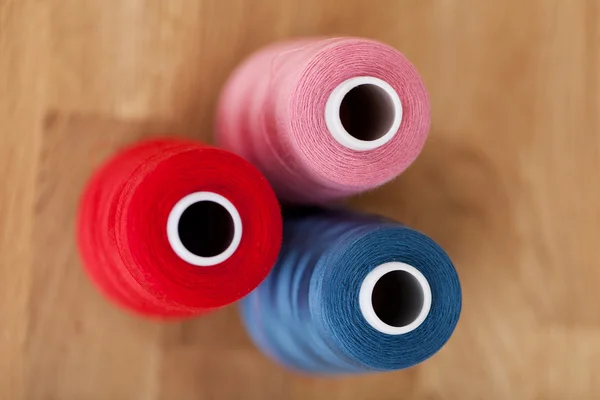 Colorful Bobbins On Table — Stock Photo, Image