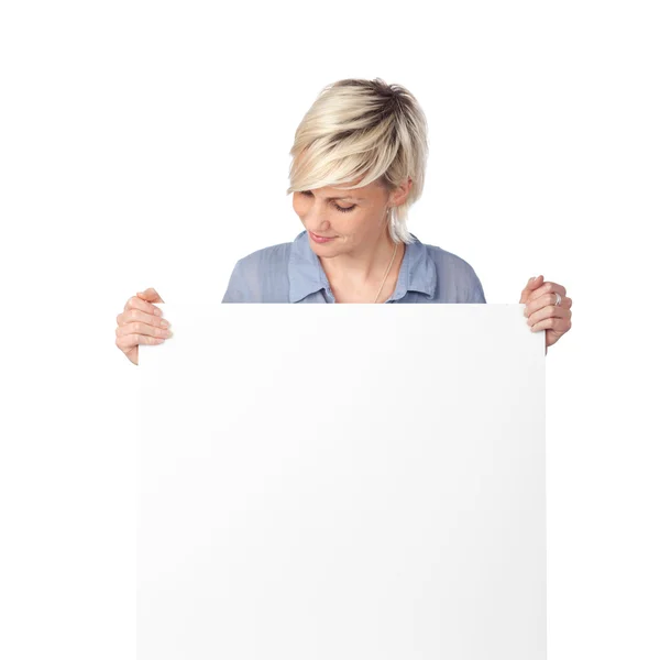 Blond Woman Looking At White Sign — Stock Photo, Image