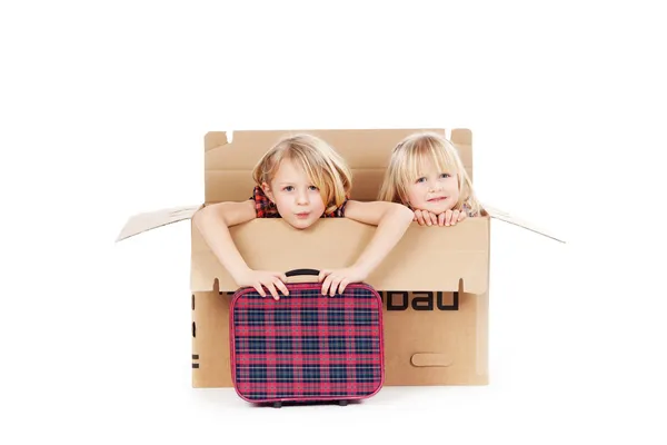 Little Girls With Suitcase Sitting In Cardboard Box — Stock Photo, Image