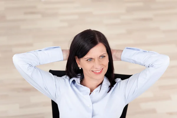 Confident relaxed businesswoman — Stock Photo, Image