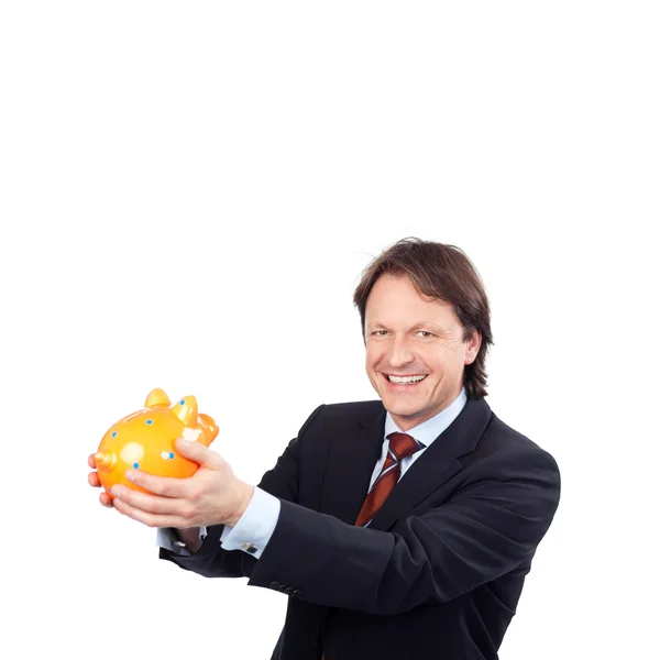 Successful man with his piggy bank — Stock Photo, Image