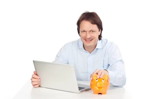 Happy man with piggy bank — Stock Photo, Image