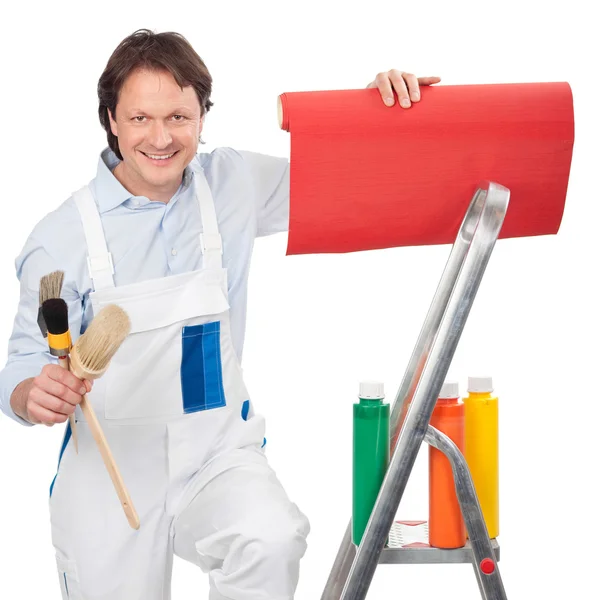 Painter with wallpeper and paints — Stock Photo, Image