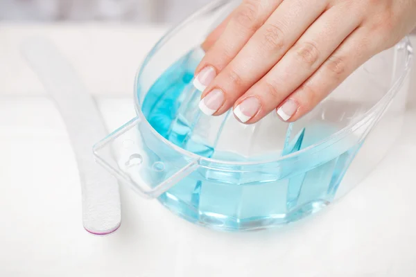 Woman having a manicure in a salon — Stock Photo, Image