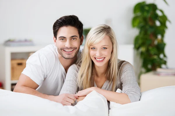 Mid Adult Couple At Sofa In House — Stock Photo, Image