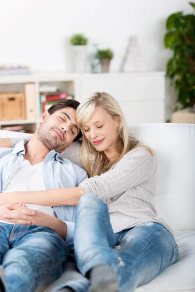 Couple With Eyes Closed Relaxing On Sofa — Stock Photo, Image