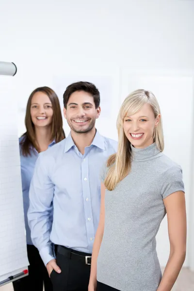 Smiling young team of businesspeople — Stock Photo, Image