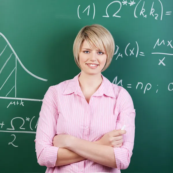 Young student or teacher with folded arms — Stock Photo, Image