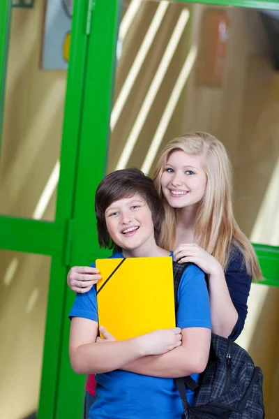 Students Standing Against Door In School — Stock Photo, Image