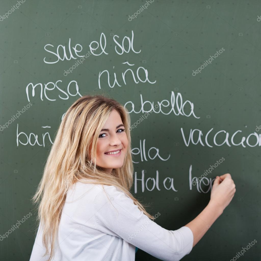 Happy young girl in Spanish class Stock Photo by ©racorn 28816115