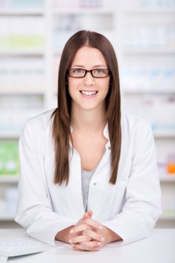 Friendly assistant in the pharmacy clipart
