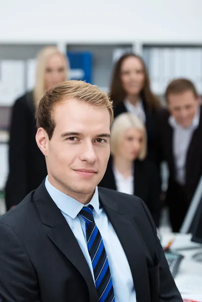Serious dedicated young businessman — Stock Photo, Image