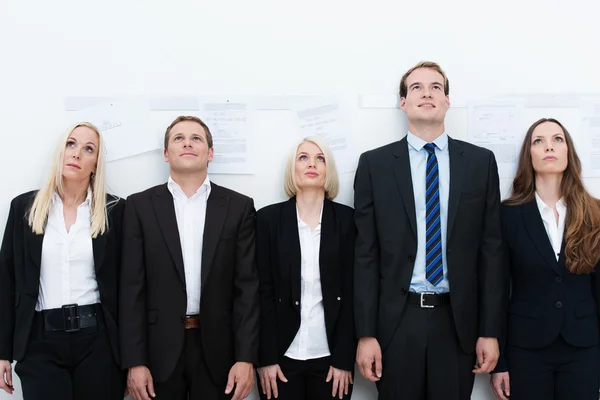 Professional team looking up — Stock Photo, Image
