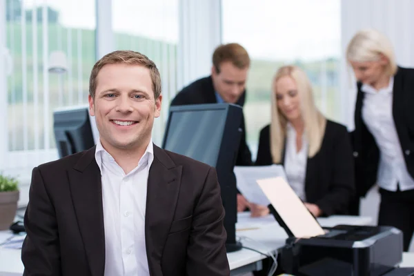 Smiling successful young businessman — Stock Photo, Image