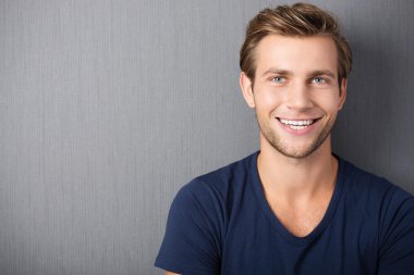 Handsome smiling young man clipart