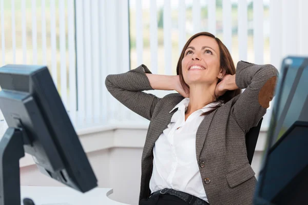 Happy businesswoman stretching — Stock Photo, Image