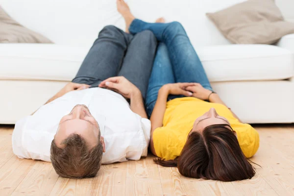 Young couple relaxing at home — Stock Photo, Image