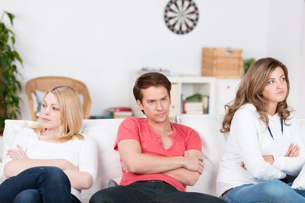 Three young friends after an argument