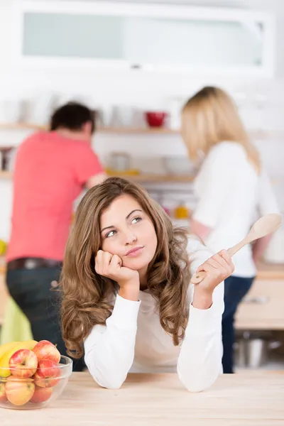 Young woman deciding what to cook — Stock Photo, Image