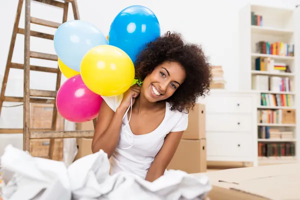 Woman celebrating her move to a new house — Stock Photo, Image