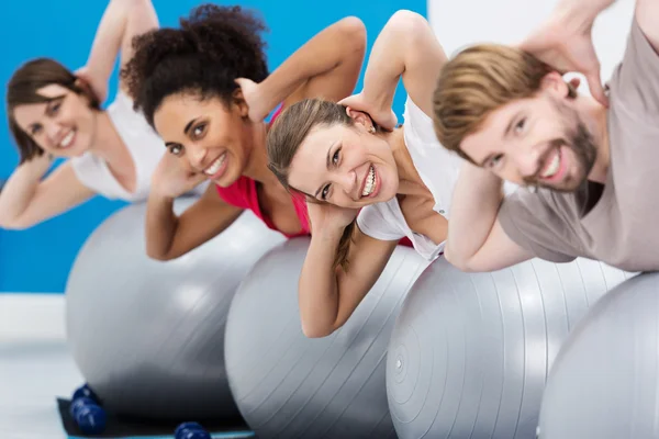 Diverse group of friends having fun at the gym — Stock Photo, Image