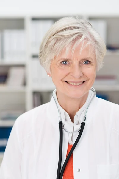 Smiling female doctor or GP — Stock Photo, Image