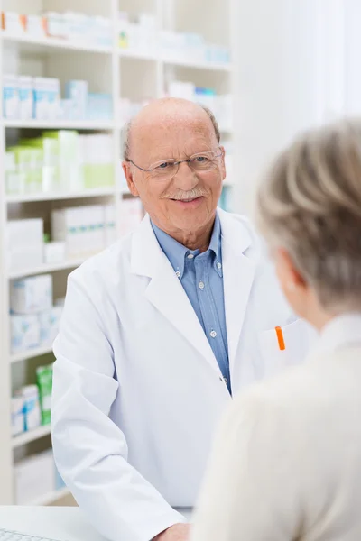Sympathetic friendly male pharmacist — Stock Photo, Image