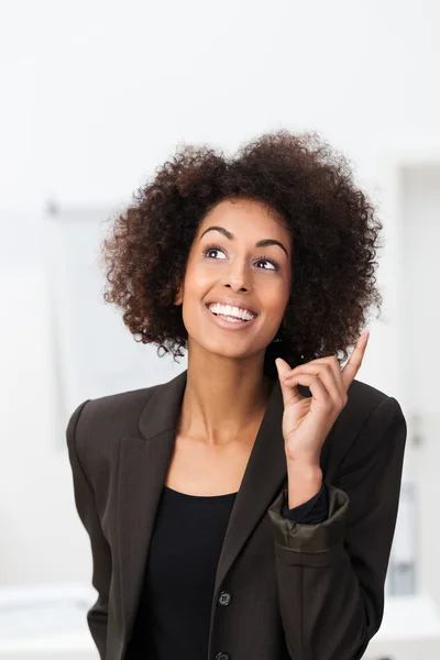 Afrikanisch-amerikanische Geschäftsfrau mit einer glänzenden Idee — Stockfoto