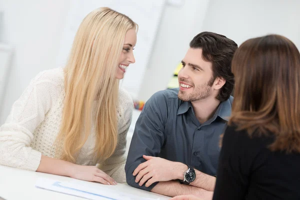 Happy couple in an interview — Stock Photo, Image