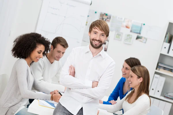 Confident smiling young male team leader — Stock Photo, Image