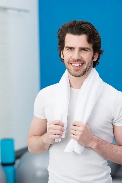 Smiling handsome man at the gym Stock Image