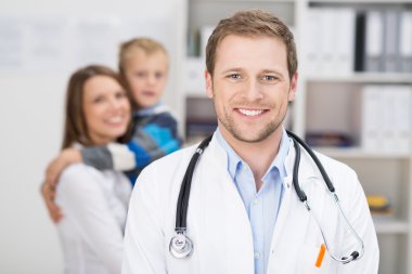 Smiling happy handsome family doctor clipart