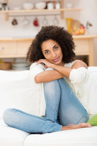 Woman relaxing on sofa — Stock Photo, Image
