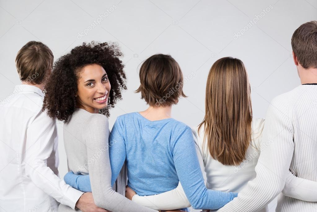 Group Of Friends Walking Away Arm In Arm Stock Photo Image By C Racorn