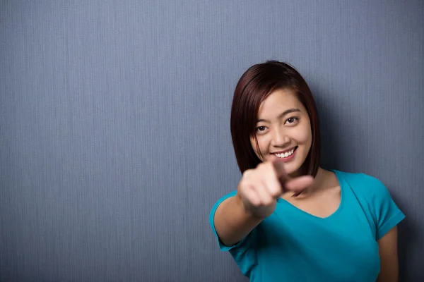 Woman pointing at the camera — Stock Photo, Image