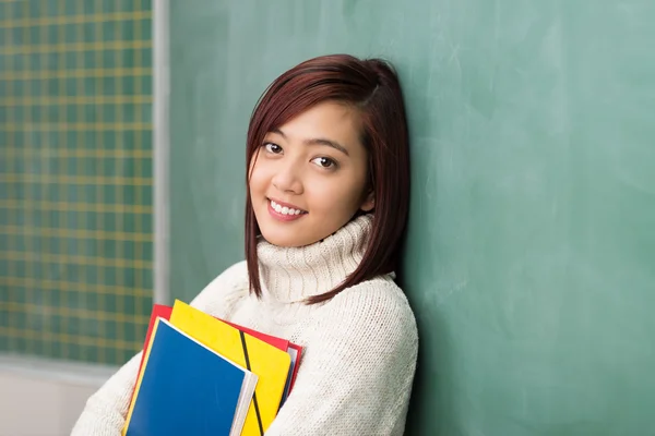 Student clutching her files — Stock Photo, Image