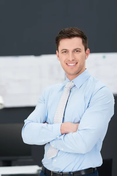 Confident relaxed young businessman — Stock Photo, Image