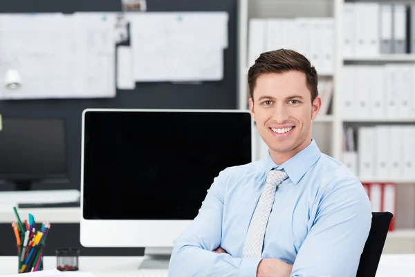 Empresário de sucesso com um sorriso feliz — Fotografia de Stock