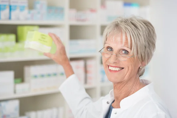 Smiling happy female pharmacist — Stock Photo, Image