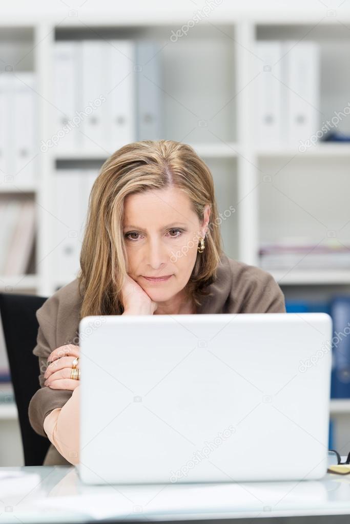 Businesswoman Staring Glumly At Her Laptop Stock Photo Image By C Racorn Businesswoman Staring Glumly At Her Laptop Stock Photo Image By C Racorn