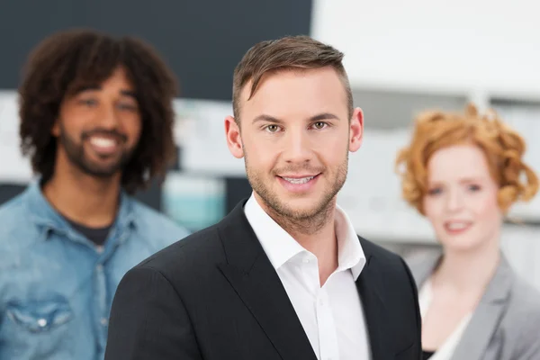 Smiling young business manager — Stock Photo, Image