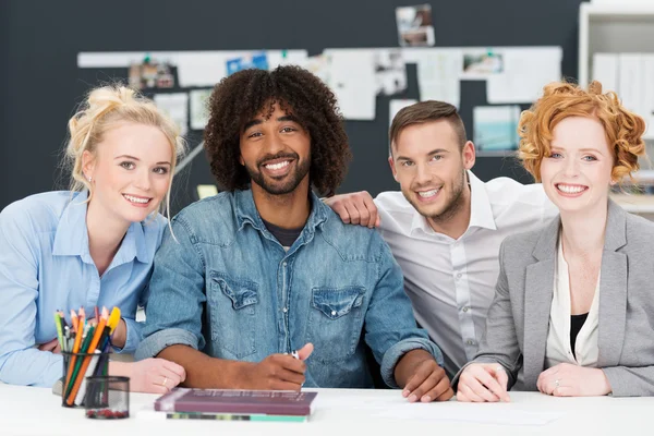 Happy African American businessman with his team — Stock Photo, Image