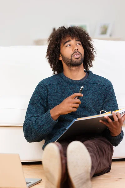 Young African American man working at home — Stock Photo, Image