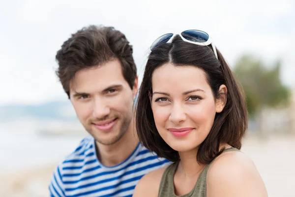 Attractive stylish couple posing outdoors — Stock Photo, Image