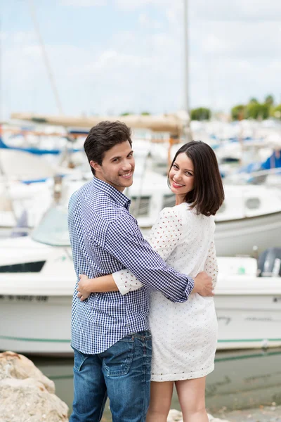 Couple turning back to look at camera