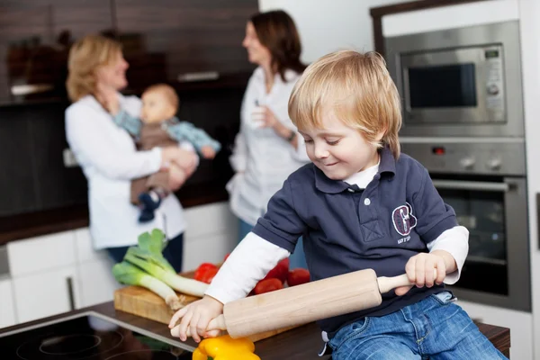 Boy holding rolling pin — Stock Photo, Image